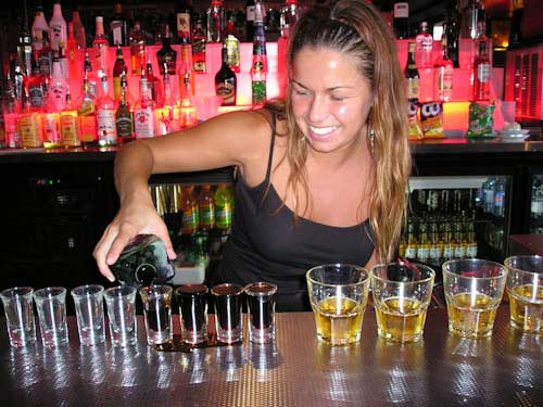 bartender pouring drinks