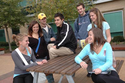 students hanging out on campus